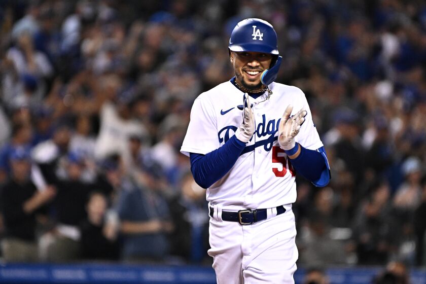 Los Angeles, California May 4, 2022-Dodgers Mookie Betts celebrates his solo home run against the Giants in the sixth inning at Dodger Stadium Wednesday. (Wally Skalij/Los Angeles Times)