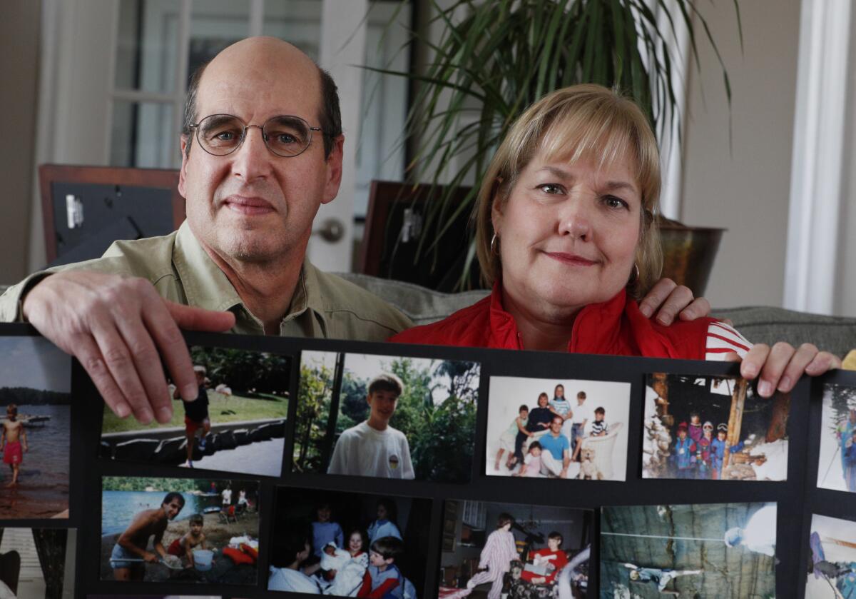 Todd and Carlene Claflin show pictures of their son throughout his life in their home in Salt Lake City.
