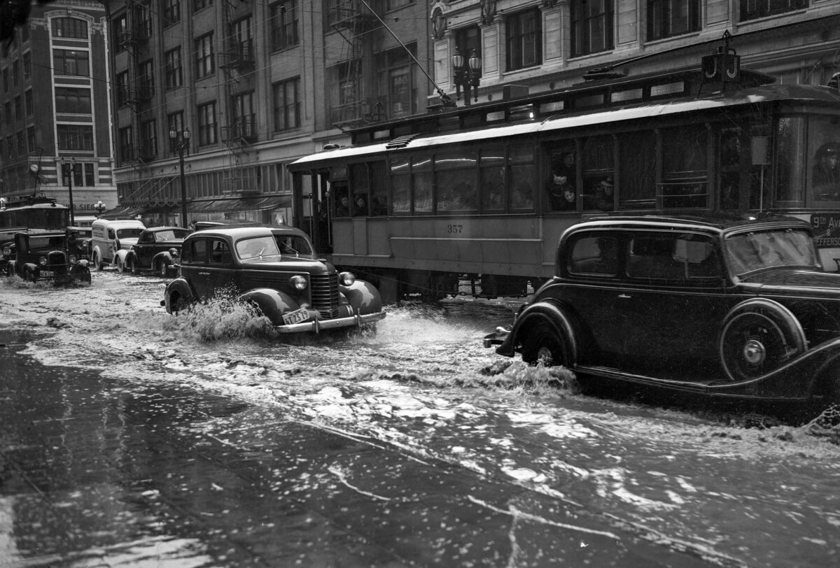 March 2, 1938: Drains could not keep up with rain filling streets in downtown Los Angeles.