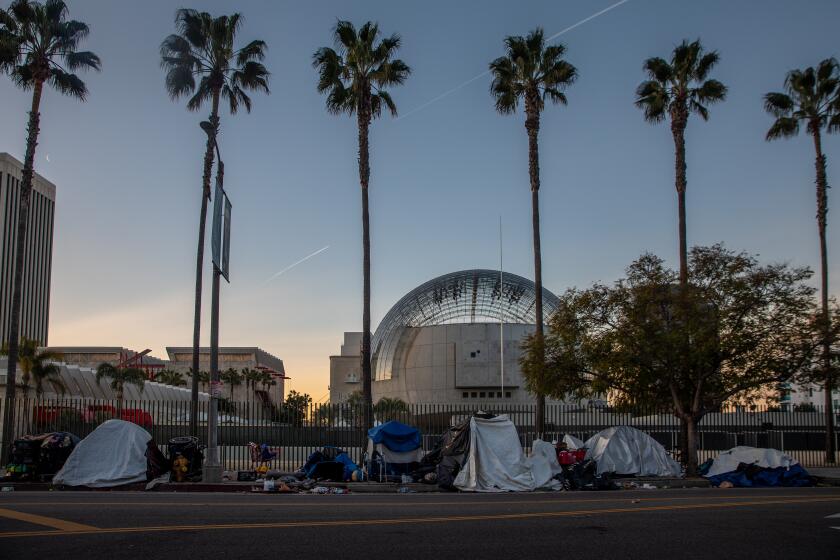 Los Angeles, CA - February 16: Under "Inside Safe" initiative by Mayor Karen Bass people live in the tents behind Academy Museum of Motion Pictures before they were moved to motel on Thursday, Feb. 16, 2023 in Los Angeles, CA. (Irfan Khan / Los Angeles Times)