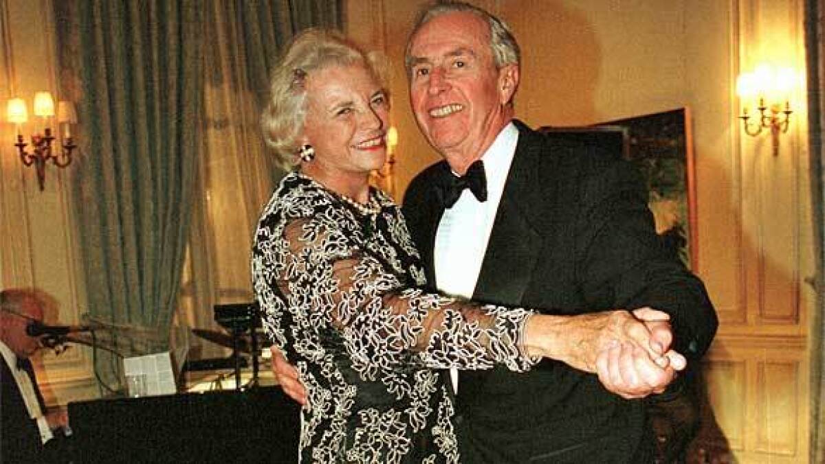 Sandra Day O'Connor dances with her husband, John, in 1998 at the annual Meridien Ball in Washington, D.C.