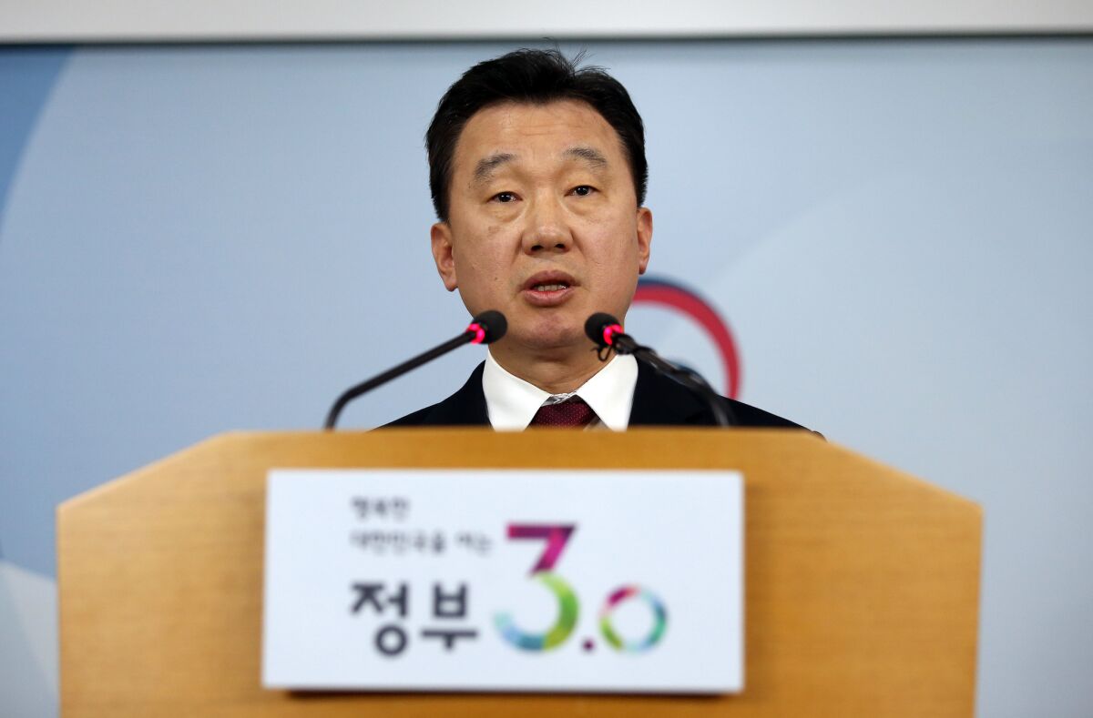South Korean Unification Ministry spokesman Jeong Joon Hee speaks about the defection of North Korean workers to South Korea during a briefing at the government complex in Seoul on April 8, 2016.