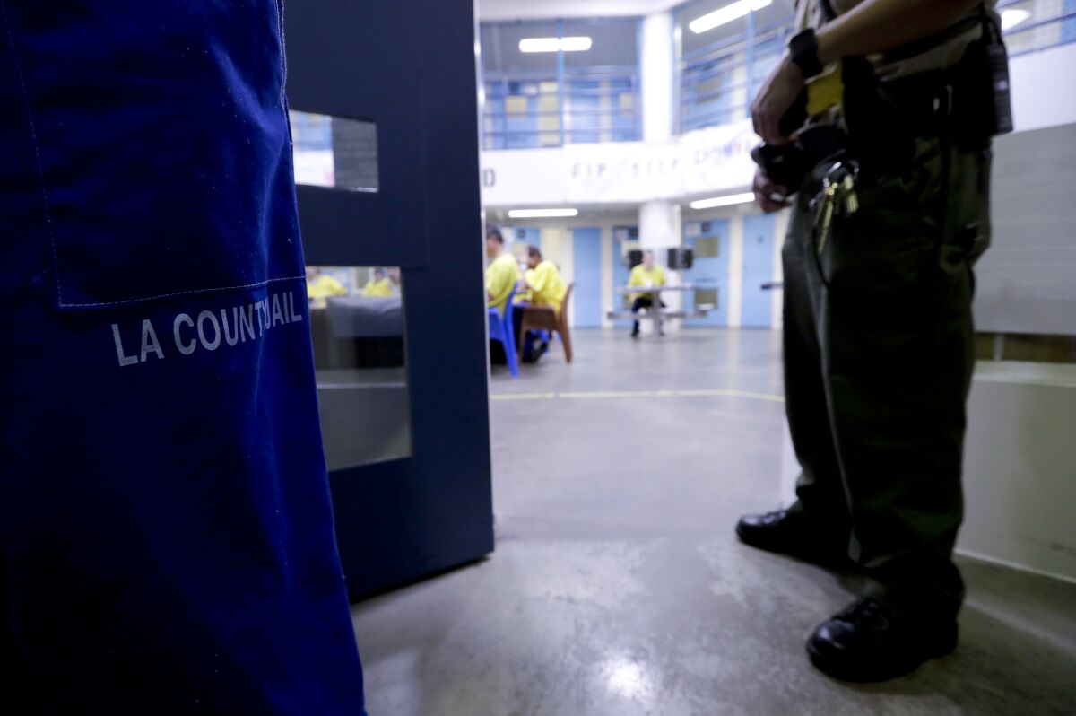 A Sheriff officer stands guard over inmates at the Twin Towers Correctional Facility April 27, 2017, in Los Angeles.
