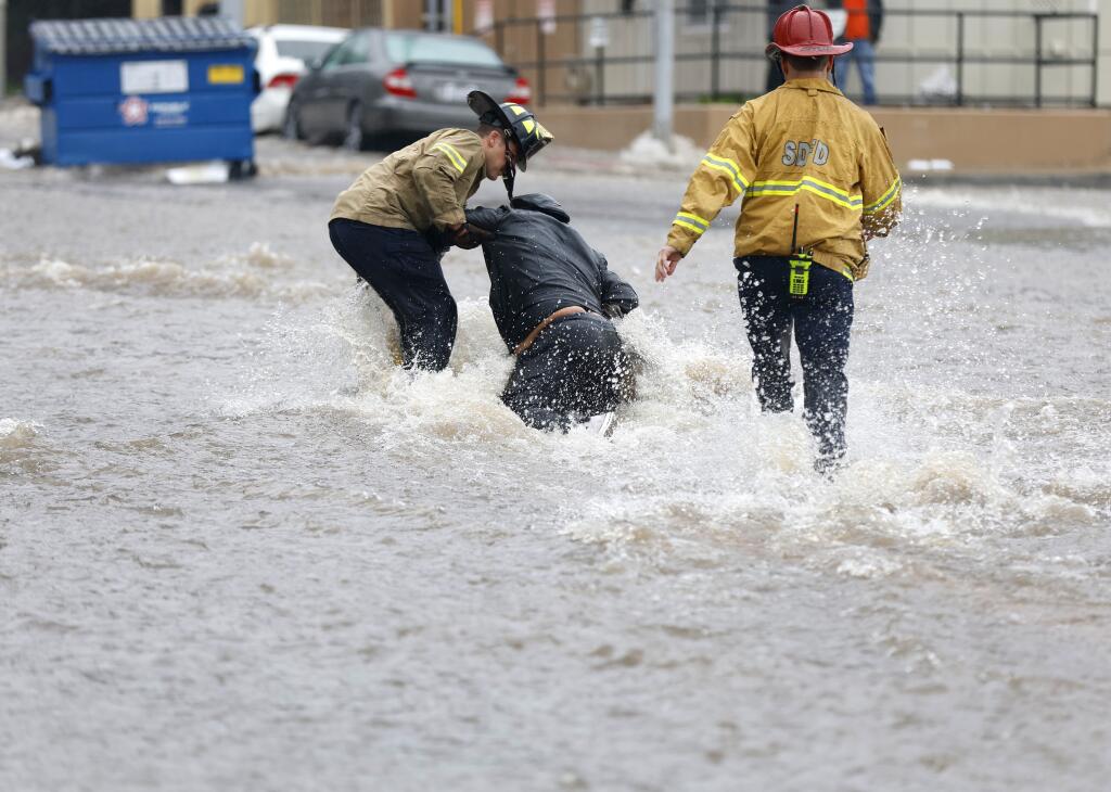 How much rain fell in San Diego? Where were records broken? The San