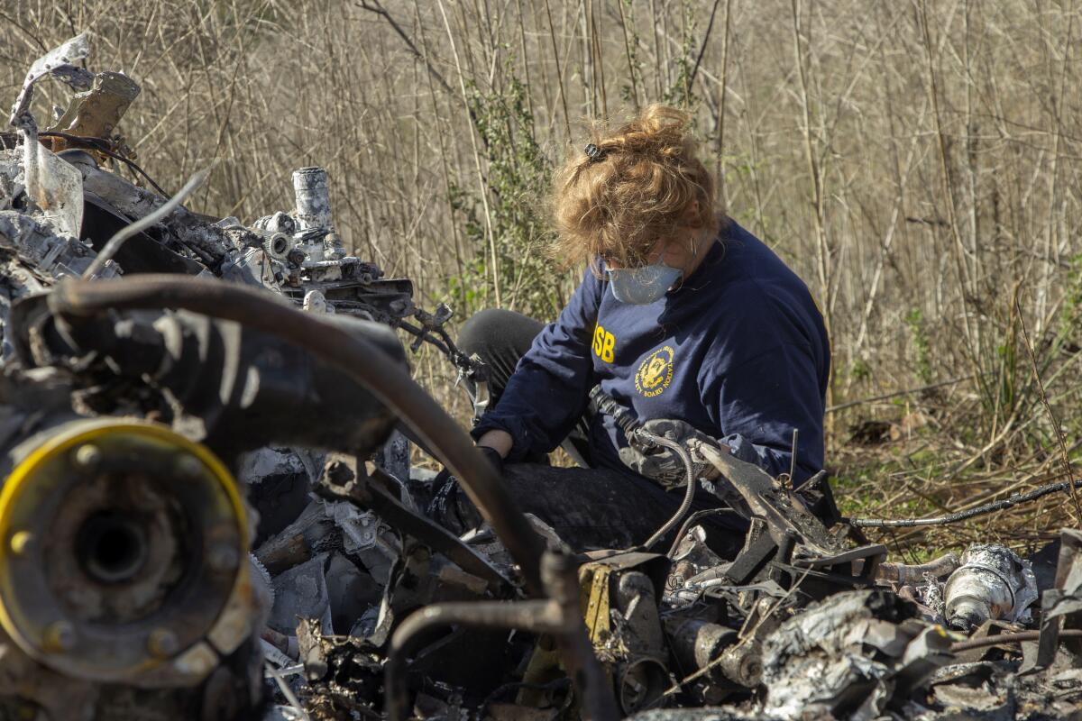 CALABASAS, CA - JANUARY 27: In this handout photo provided by the National Transportation Safety Board, an investigator works at the scene of the helicopter crash that killed former NBA star Kobe Bryant and his 13-year-old daughter Gianna on January 27, 2020 in Calabasas, California. All nine people on board, including the pilot, perished in the crash as they were flying to Bryant's Mamba Sports Academy in Thousand Oaks, where he was going to coach Gianna in a tournament game. (Photo by James Anderson/National Transportation Safety Board via Getty Images) ** OUTS - ELSENT, FPG, CM - OUTS * NM, PH, VA if sourced by CT, LA or MoD **