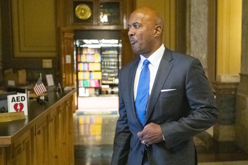 FILE - In this Oct. 23, 2019 file photo, Indiana Attorney General Curtis Hill arrives for a hearing at the state Supreme Court in the Statehouse, in Indianapolis. Hill is running for reelection as he awaits the outcome from professional misconduct allegations of drunkenly groping four women that threaten his law license. Hill announced his bid for a second term Thursday, Nov. 14, 2019, releasing a video in which he says he won’t back down from “partisan attacks, the media, and even Republicans embarrassed to defend our values.” (AP Photo/Michael Conroy File)