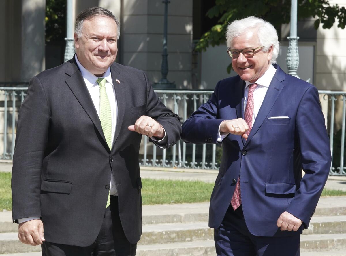Secretary of State Mike Pompeo, left, with Polish Foreign Minister Jacek Czaputowicz 