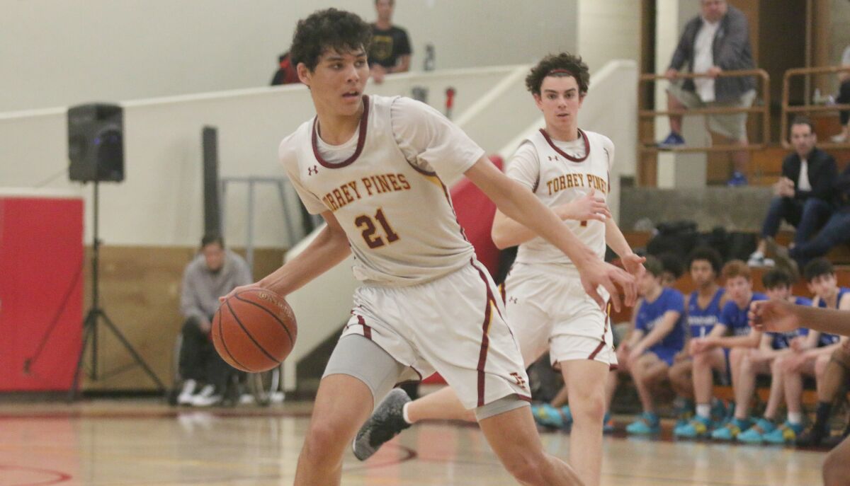 In his final game at Torrey Pines, senior Brand Angel had a team high 18 points.