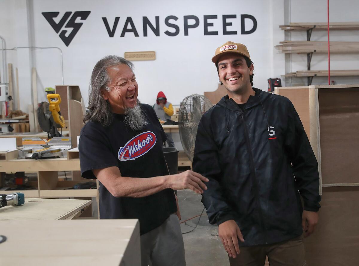 Wing Lam, founder of Wahoo's Fish Taco and Duran Morley, owner and founder of Vanspeed van conversion shop.