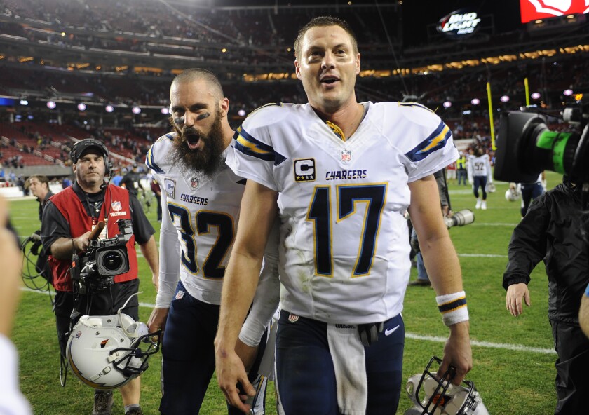 Eric Weddle and Philip Rivers celebrated several victories, such as this one in 2014. But they never got past Tom Brady.