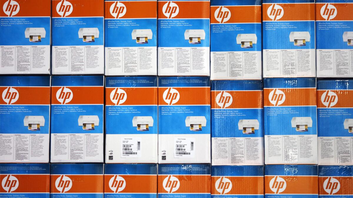 Hewlett-Packard CEO Meg Whitman has said it will take a year to disengage the sluggish printer-and-PC division from units that sell commercial tech hardware, software and services.