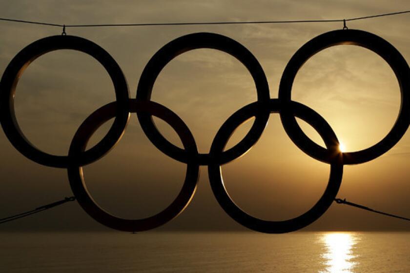 The sun sets on the Black Sea in Sochi, Russia, beyond an Olympic rings display. Will the U.S. Olympic Committee consider Los Angeles as a potential site for the 2024 Olympic Games?