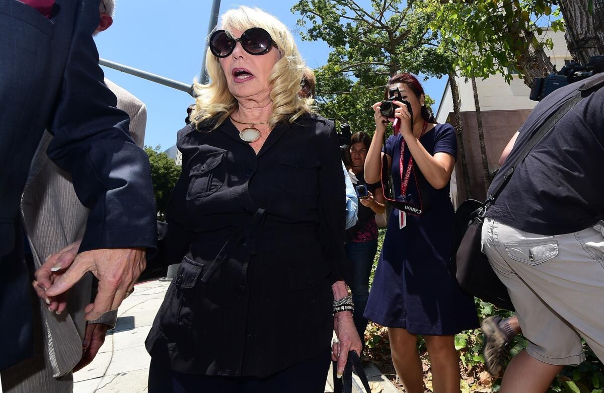 Shelly Sterling testified in court Thursday that her husband Donald was happy about the sale of the Clippers to former Microsoft CEO Steve Ballmer.