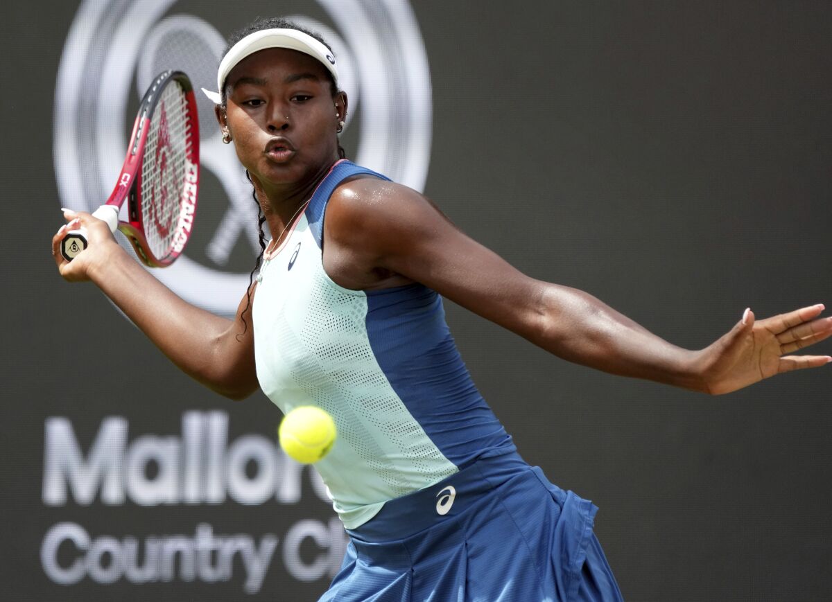 FILE - Alycia Parks from the United States returns the ball to Ons Jabeur from Tunisia during their WTA tournament round of 16 tennis match in Berlin, Germany, June 16, 2022. On Sunday, Feb. 5, 2023, Parks secured a stunning 7-6 (7), 7-5 upset win over WTA Finals champion Caroline Garcia in the Open Métropole de Lyon final to clinch her first career title. (AP Photo/Michael Sohn, File)