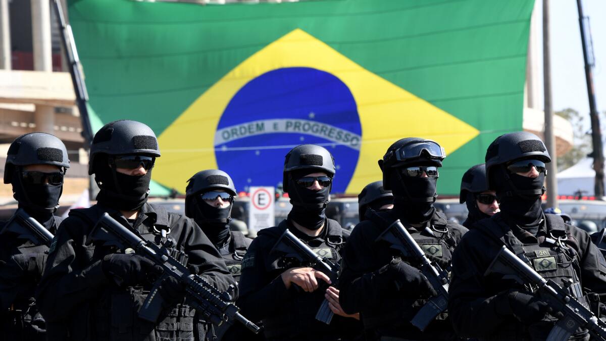 Brazilian army special forces participate in a ceremony showcasing security forces to be deployed during the Rio Olympics.