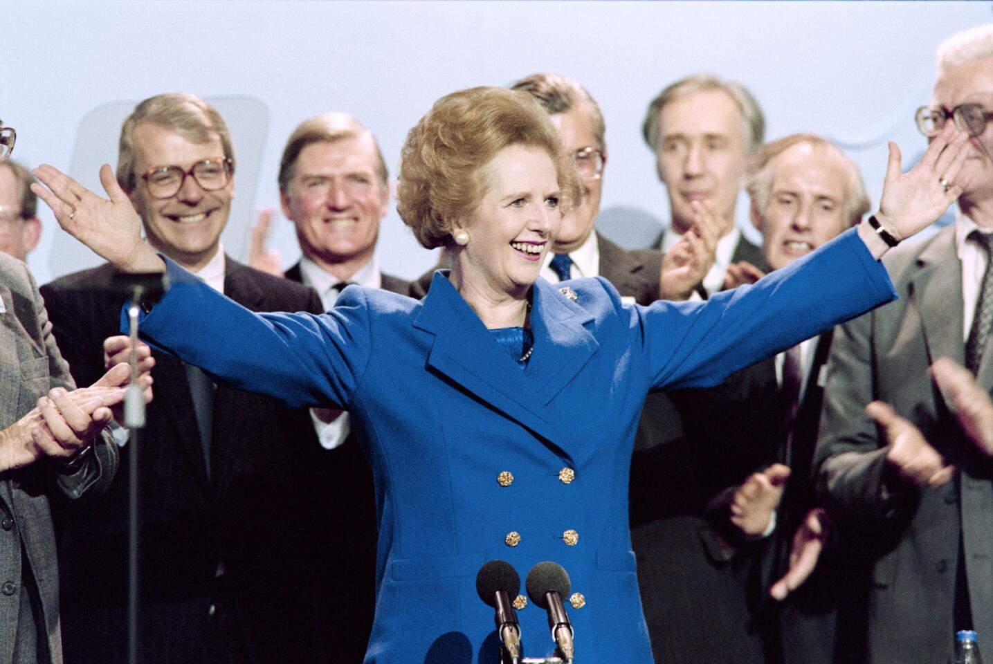 Margaret Thatcher, the "Iron Lady" of British politics, was the first woman to become prime minister of Britain and the first to lead a major Western power in modern times. It was a long road. Her critics panned the principles known as Thatcherism -- that personal responsibility and hard work would lead to national prosperity, and that free-market democracies should stand firm against aggression -- but gave her grudging respect in the end. Said Thatcher: "You don't follow the crowd, you make up your own mind." Thatcher is seen above in 1989.
