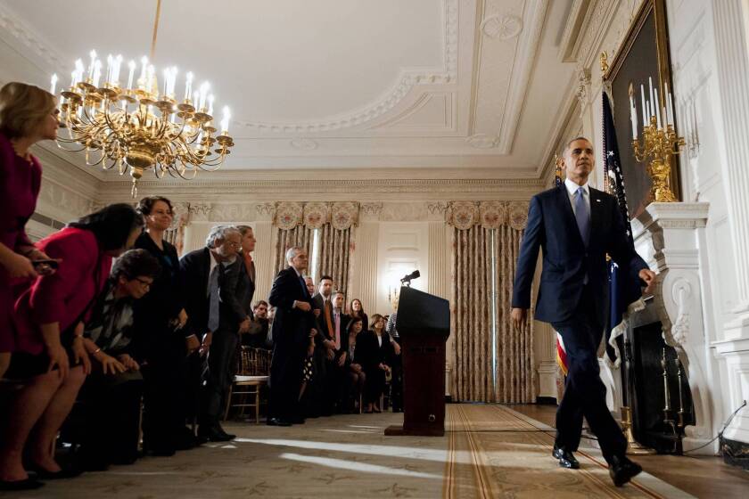 President Obama, leaving the White House State Dining Room after speaking about the government shutdown, had a message for Congress: "How business is done in this town has to change."