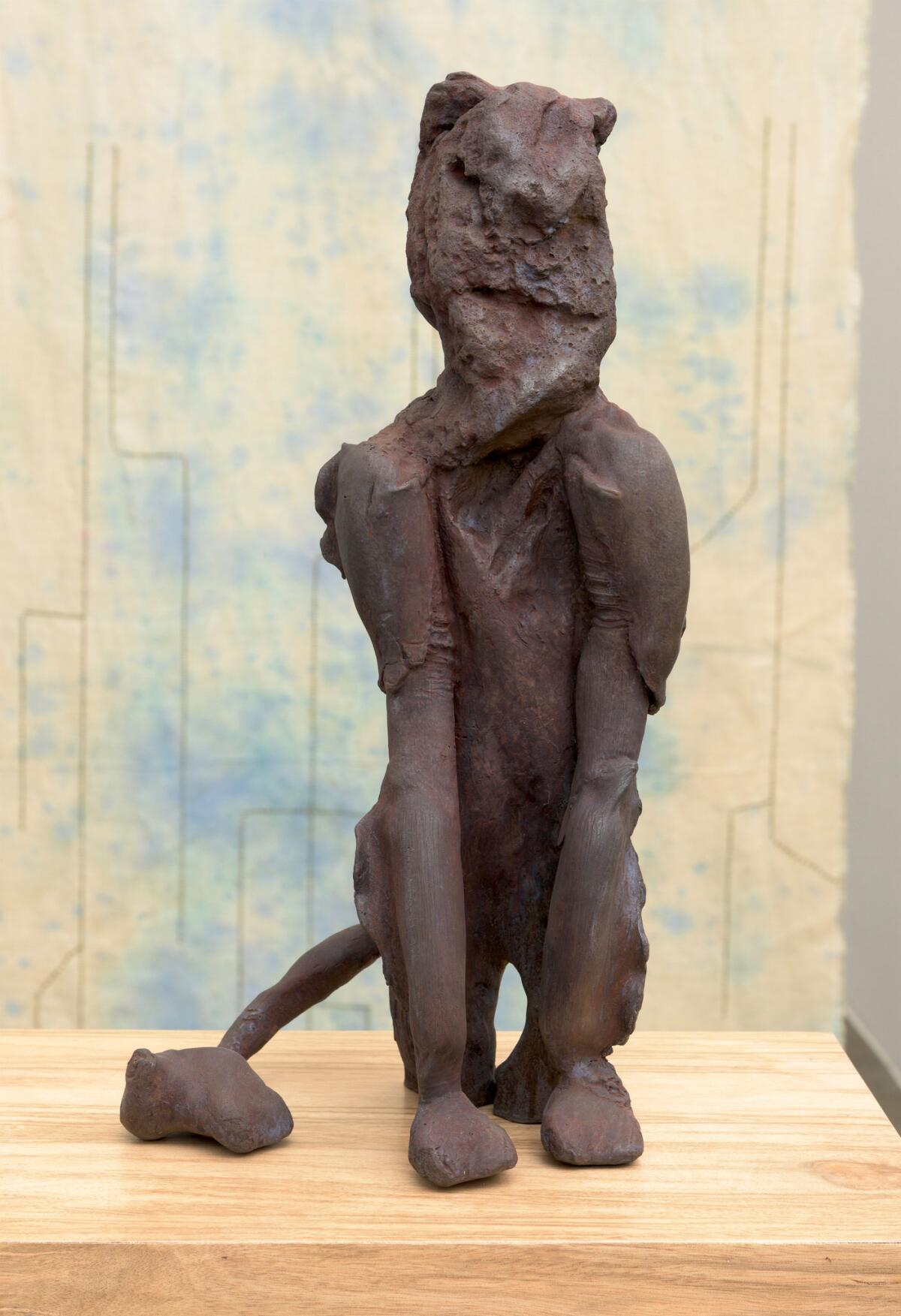 "Lion" bronze sculpture by Nancy Evans, cast from bird of paradise casing, rock and driftwood. (Alan Shaffer / Jason Vass)