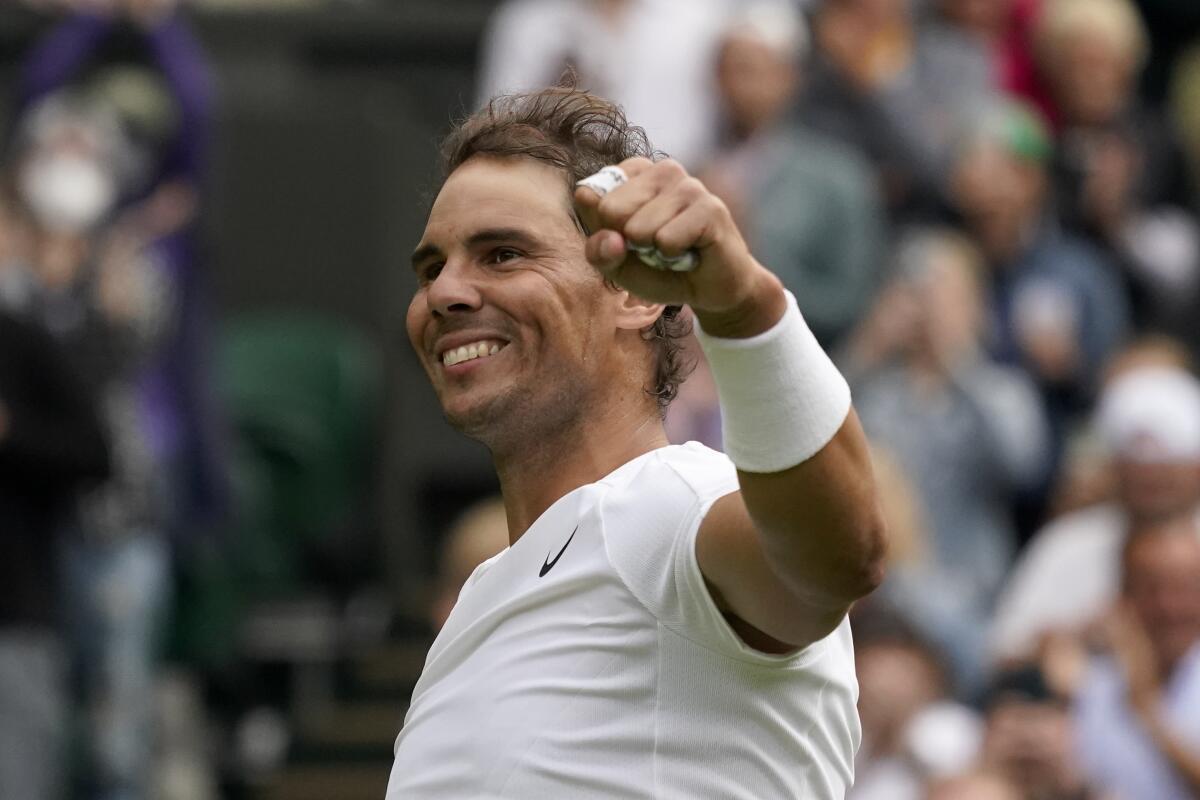 Rafael Nadal celebrates after defeating Francisco Cerundolo in a first-round men's singles match at Wimbledon on Tuesday.