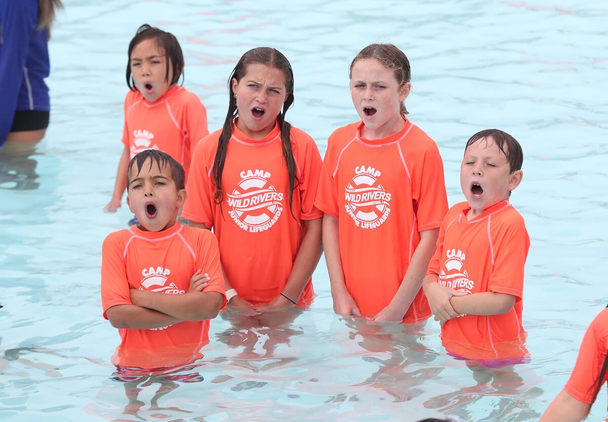Kids join a swim lesson at Wild Rivers for the World’s Largest Swimming Lesson.