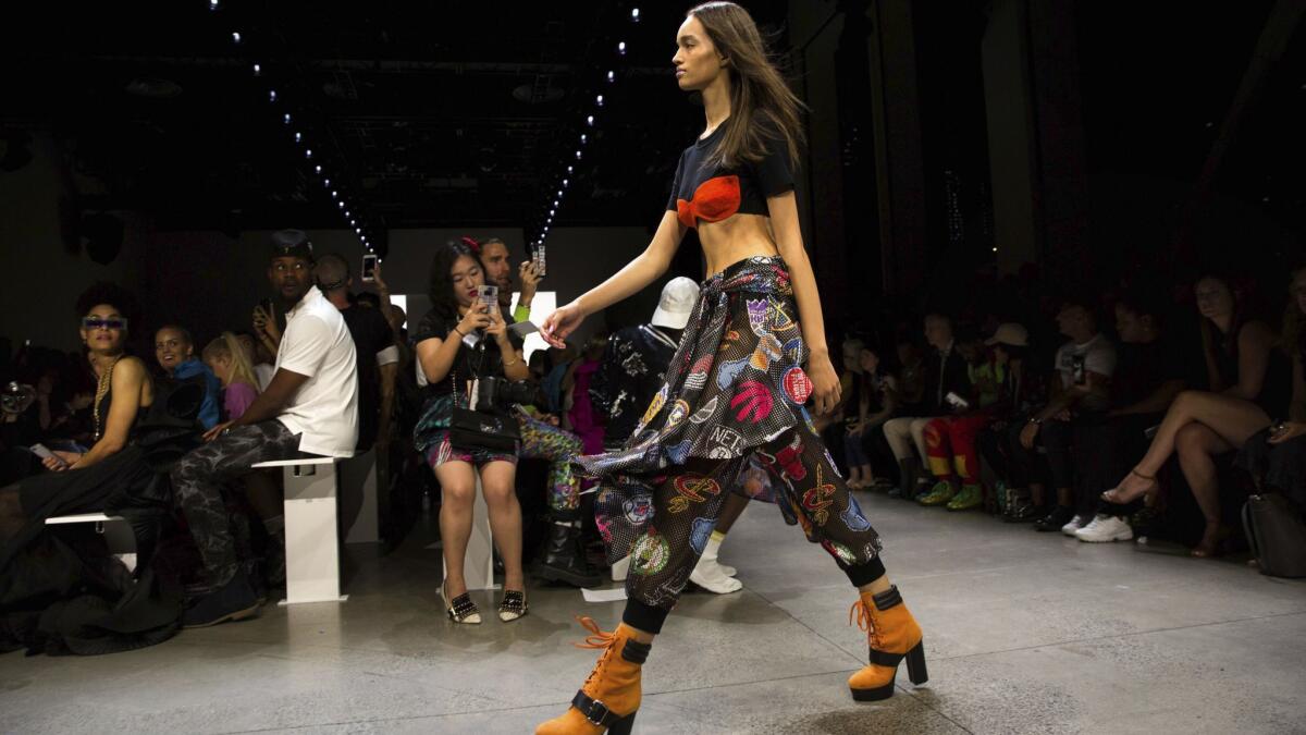 A model on wears a skirt emblazoned with the logos of the the National Basketball Assn. teams.