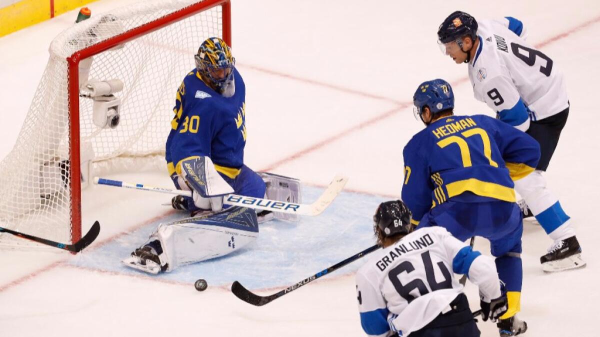 Swedish goalie Henrik Lundqvist makes a save on a third period shot during a game against Finland on Sept. 20.