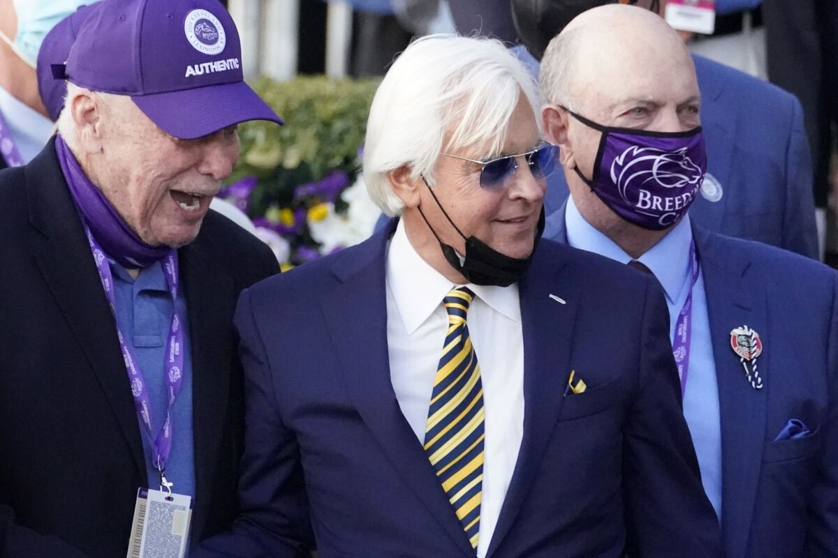 Trainer Bob Baffert, center, and others celebrate Authentic's win in the Breeders' Cup Classic on Nov. 7, 2020.