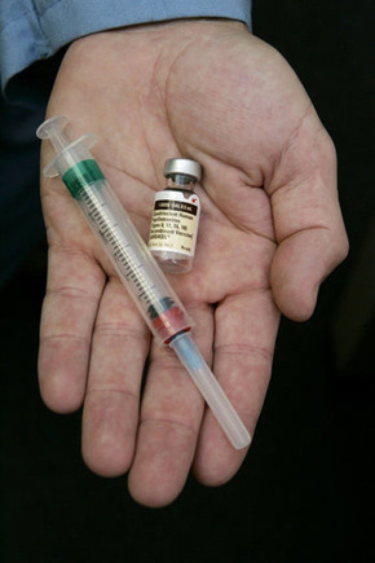 A physican holds the HPV vaccine Gardasil. The vaccine prevents infections from four strains of the sexually transmitted human papillomavirus, which are responsible for nearly all cases of cervical cancer.