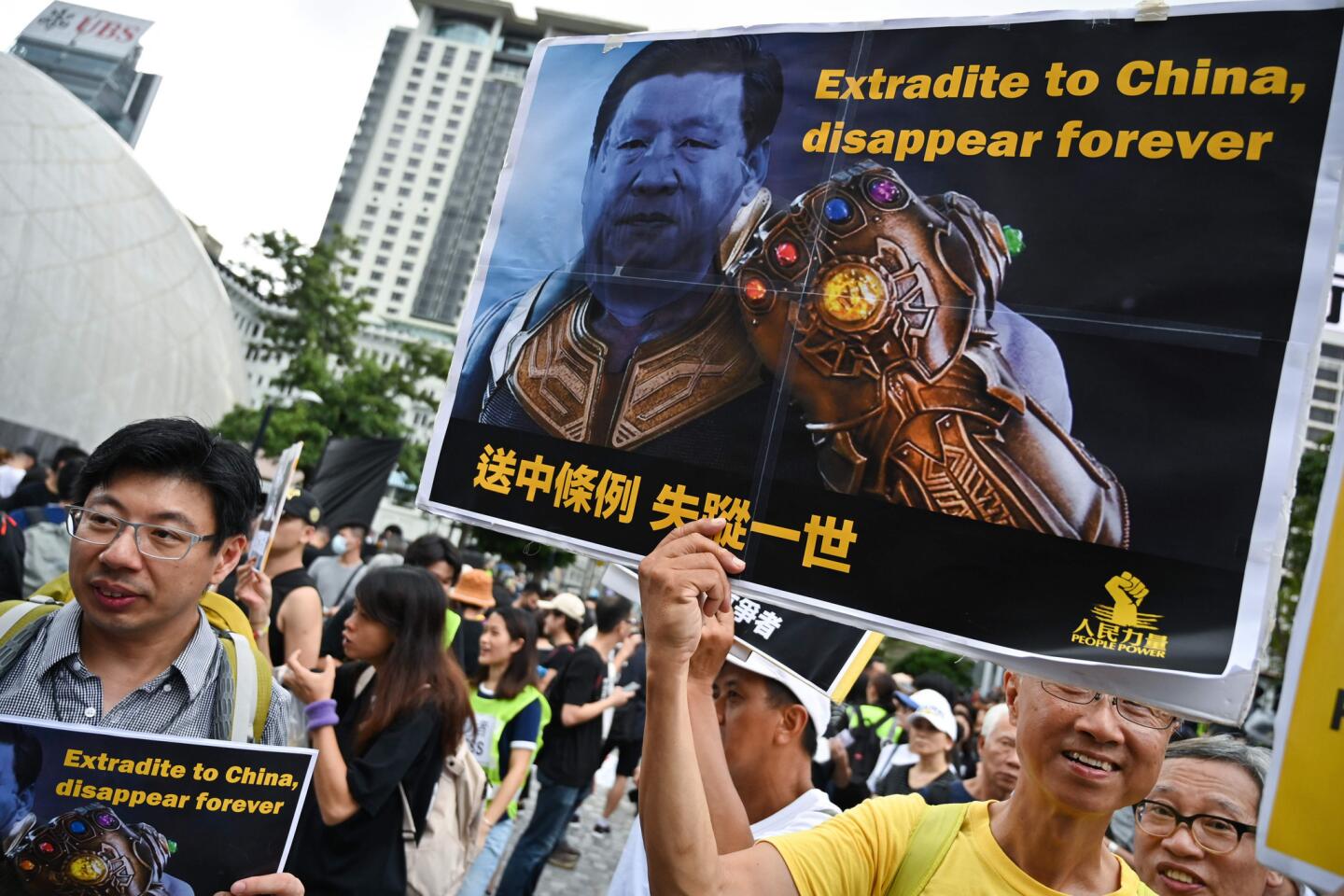 Protesters prepare to march to the West Kowloon station, where high-speed trains depart for the Chinese mainland.
