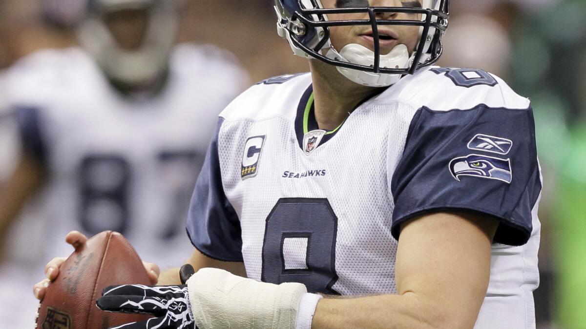 Matt Hasselbeck takes his place in Seattle's Ring of Honor - The San Diego  Union-Tribune