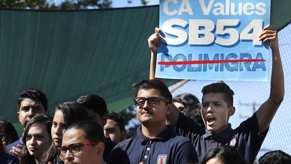 Students at Academia Avance Charter School in Highland Park in October 2017 rally in support of Senate Bill 54, California's so-called sanctuary state law.