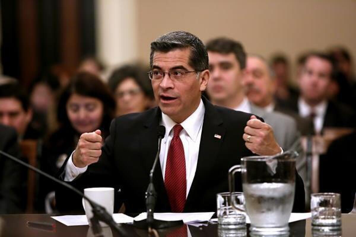 Rep. Xavier Becerra (D-Los Angeles) testifies Tuesday at a confirmation hearing for state attorney general.