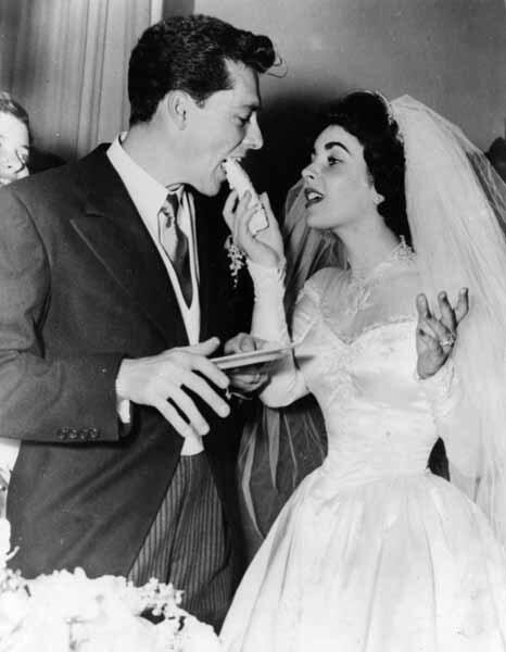 Film star Elizabeth Taylor and her first husband Nick Hilton, of the hotelier family, on their wedding day.