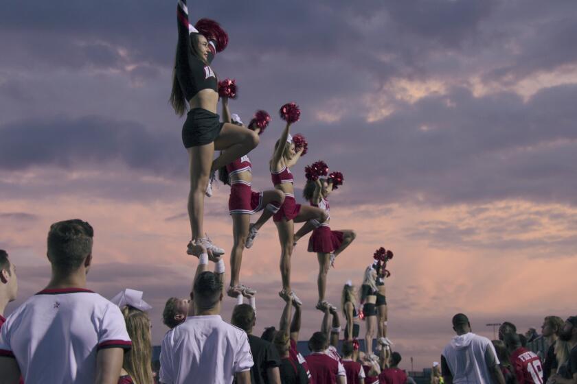 CHEER Navarro cheer squad in action in the Netflix documentary, Cheer. (Netflix)