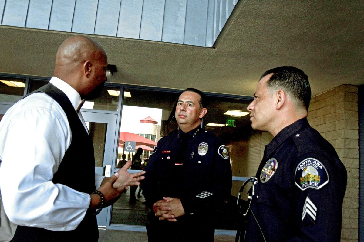 Irving meets with security officers at the campus.