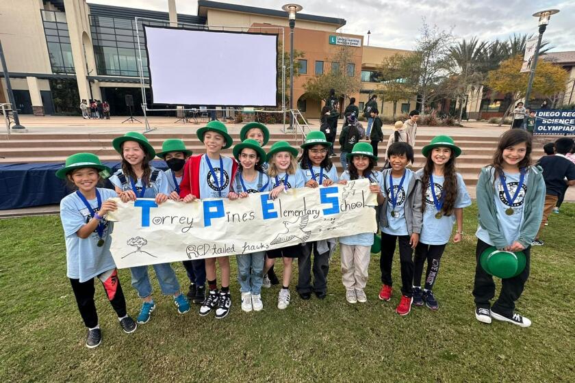 The Torrey Pines Elementary School Red-tailed Hawks team celebrating their first place win at the San Diego Regional Science Olympiad Division A tournament.