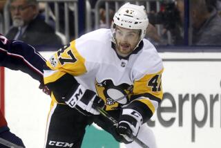 FILE - Pittsburgh Penguins forward Adam Johnson in action during an NHL hockey game.