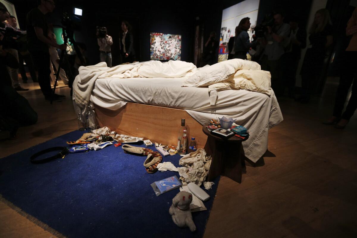 Tracey Emin's 1998 work "My Bed" will go on long-term loan to the Tate in London.