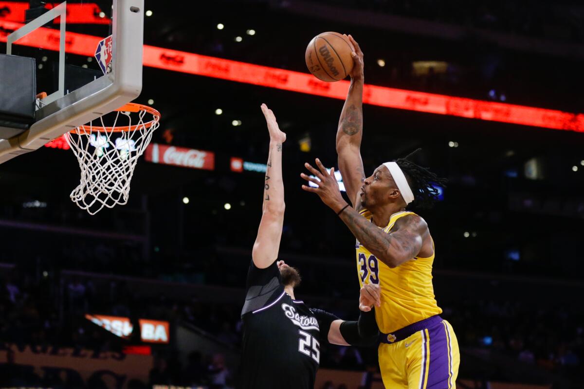 Dwight Howard attempts a dunk during a Lakers game.