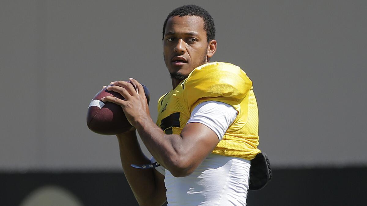 UCLA quarterback Brett Hundley takes part in a practice session Aug. 20. The Bruins' offense is centered on Hundley's speed.