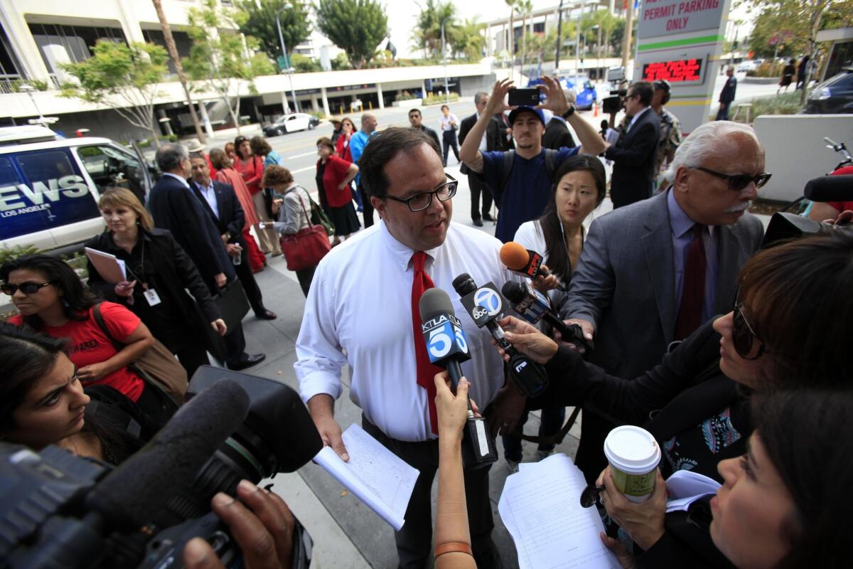 Alex Caputo-Pearl answers a question during a UTLA forum in June. The union president alleges he and 11 other Crenshaw High teachers were let go for union activism.