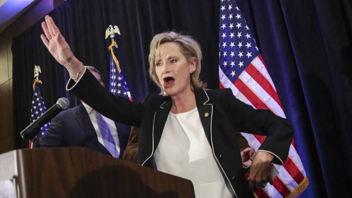 Sen. Cindy Hyde-Smith (R-Miss.) waves to supporters after speaking during an election-night event in Jackson, Miss., on Nov. 27.