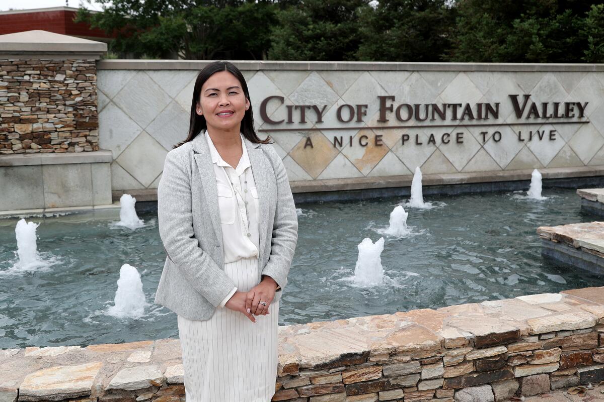 New Fountain Valley City Manager Maggie Le stands outside City Hall.