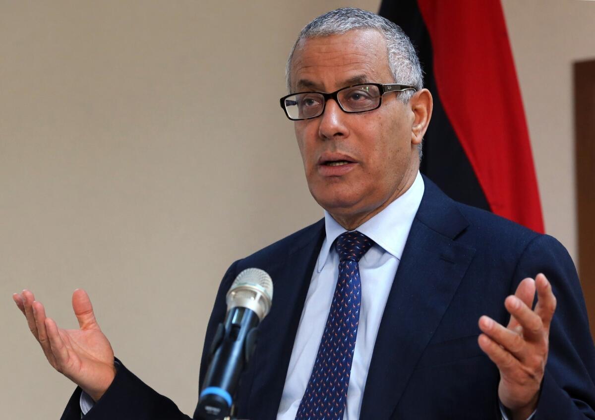 Libyan Prime Minister Ali Zeidan announces during a news conference in Tripoli that five Egyptian diplomats freed by their kidnappers as part of a swap will return to Egypt.