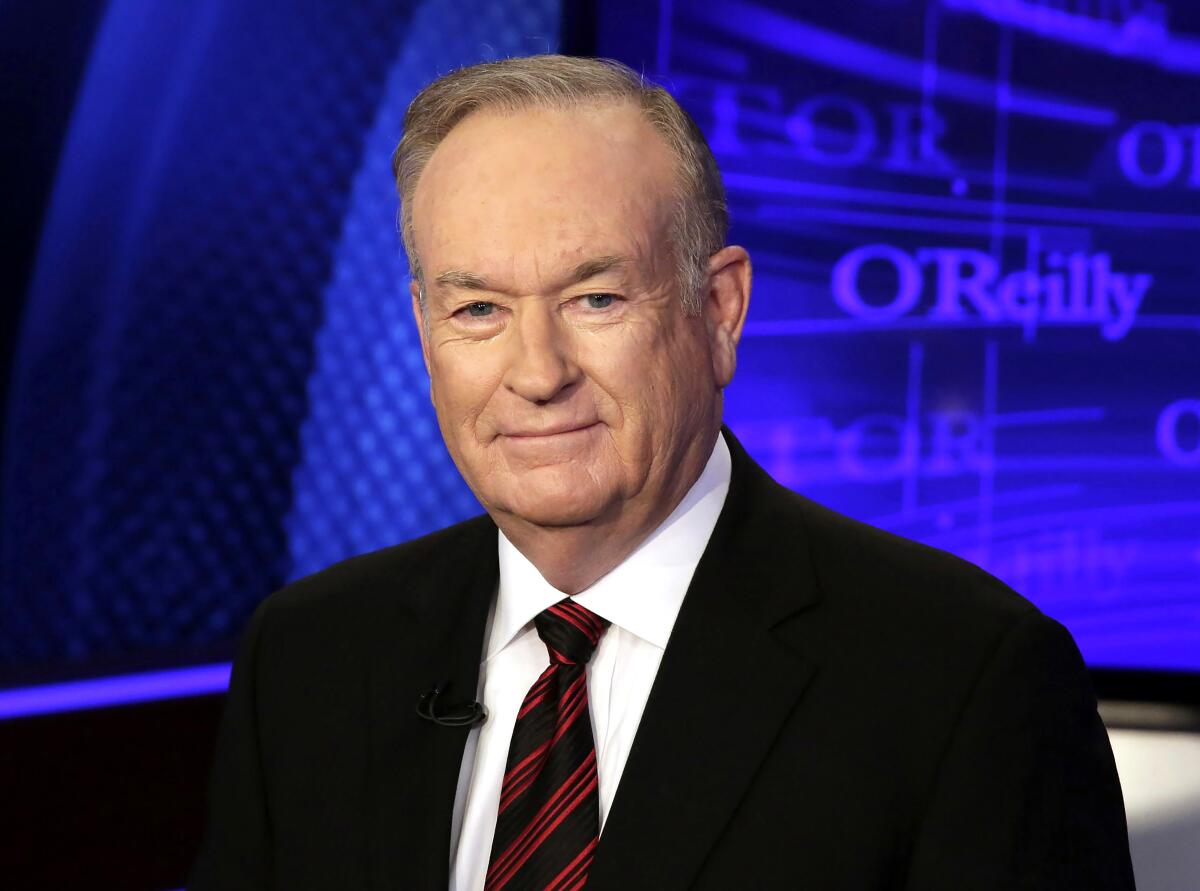 Bill O'Reilly in a dark suit, white shirt and tie in front of a screen that says "O'Reilly."