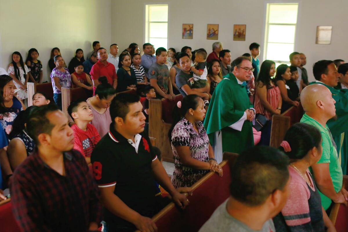Father Roberto Mena