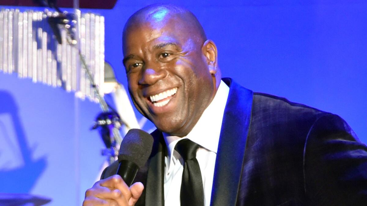 Magic Johnson speaks during a charity event at the Beverly Hilton Hotel on Oct. 11, 2014.