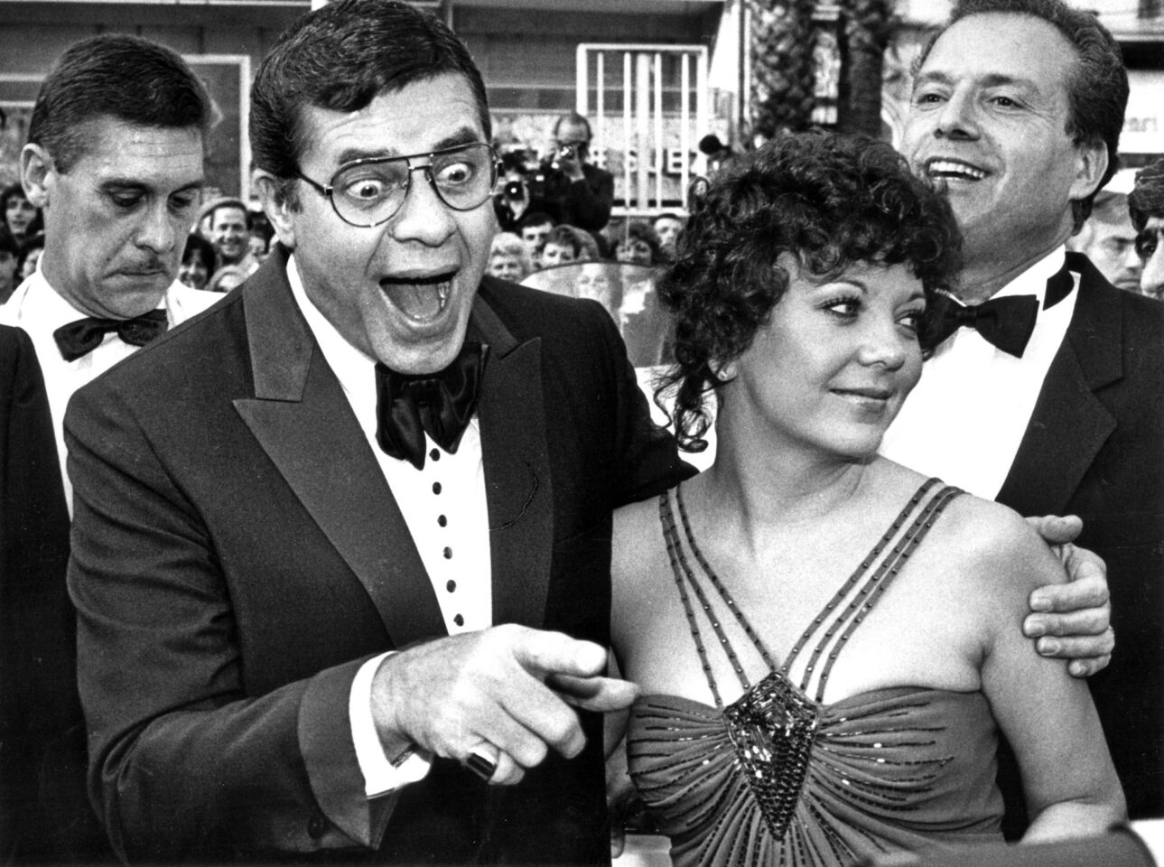 The outrageous funnyman co-hosted the 28th Academy Awards in 1956 in L.A., while Claudette Colbert and writer-director Joseph Mankiewicz hosted a satellite ceremony in New York. He revisited the role in 1957. Lewis and his wife, SanDee, above, pictured at the Cannes Film Festival in 1983.