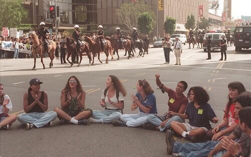 Police move in as student protesters block Wilshire Blvd. in support of affirmative action.