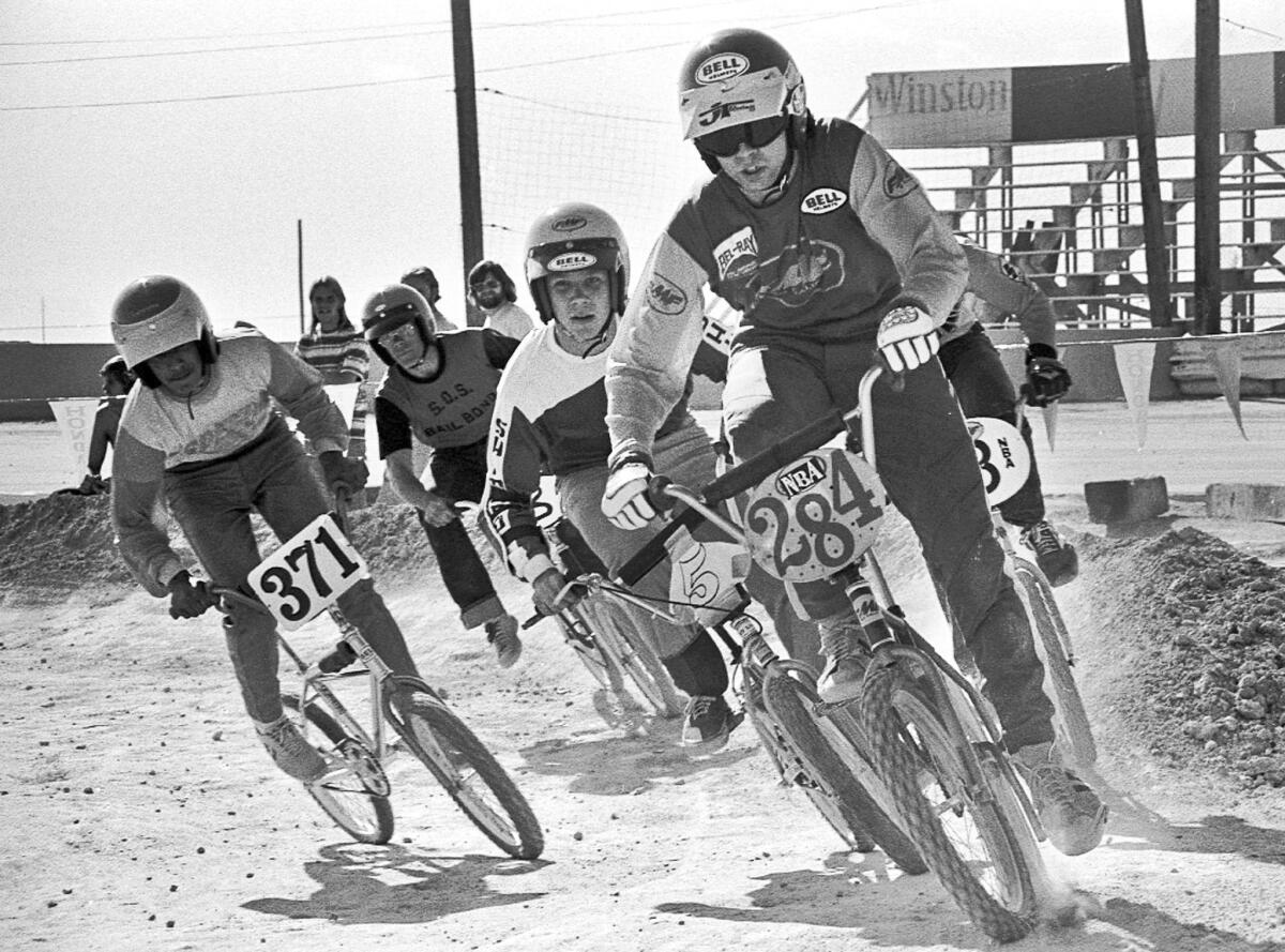 Scot Breithaupt leads the pack in a BMX bicycle race in Las Vegas in 1976. Breithaupt organized races on dirt motorcycle courses in the early 1970s and founded BMX. In 2008, the sport debuted in the Olympics in Beijing.